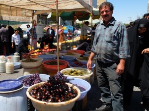 Turshichi in Osku Bazaar - Pickle seller with a big bowl of pickled grapes - shani turshisi